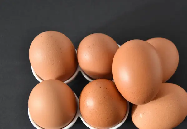 Closeup Shot Brown Farm Eggs Black Table — Stock Photo, Image