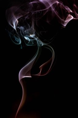 An abstract colorful smoke-like illustration isolated on a black background