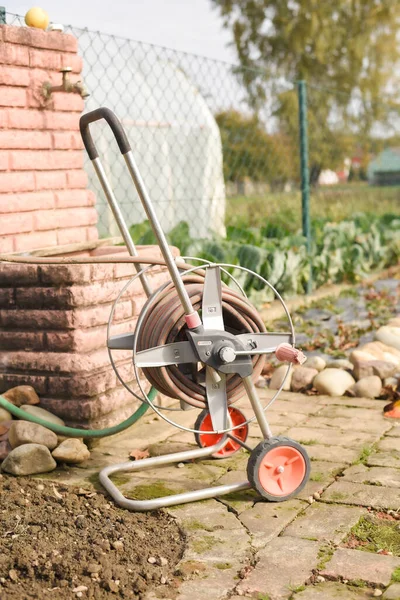 Vertical Shot Hose Trolley Backyard — Stock Photo, Image