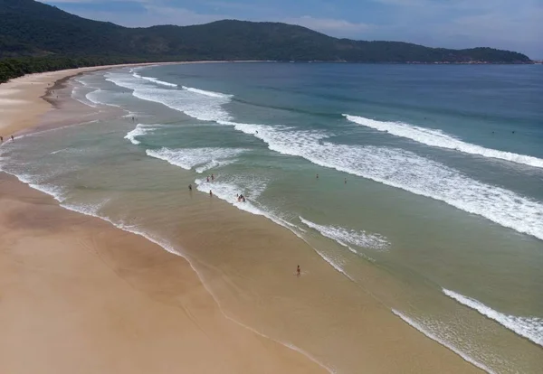 Aerial View Sea Waves Crashing Sandy Beach Covered Green Hills — Stock Photo, Image