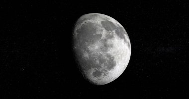 Siyah zemin üzerinde yıldızlar ve kuyruklu yıldızlar olan bir ayın makro görüntüsü.