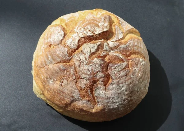 Bread is a staple food prepared from a dough of flour (usually wheat) and water, usually by baking. Throughout recorded history and around the world