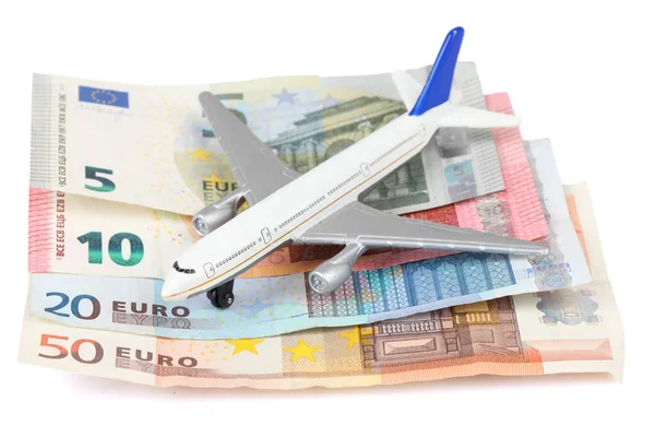 Brinquedo Avião Sobre Notas Euro Isoladas Num Fundo Branco Poupar — Fotografia de Stock
