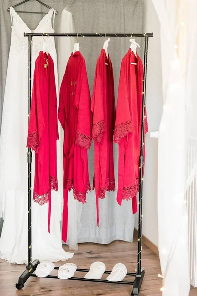 Vertical Shot Hanger Red Dressing Gowns Wedding Dress Background — Stock Photo, Image