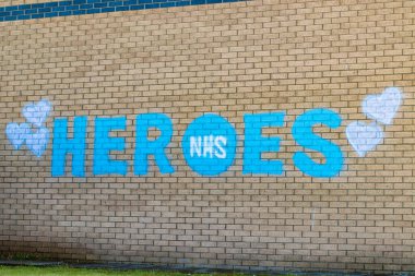 The NHS Heroes, İngiltere 'nin Glasgow şehrinde bir duvardaki duvar resmi.