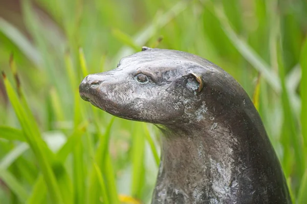 A close-up of an animal metal sculpture in garden