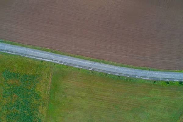 Pløjet Landbrugsmark Ved Siden Vej - Stock-foto