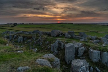 The Limestone Corner on Hadrian's Wall against scenic sunset clipart