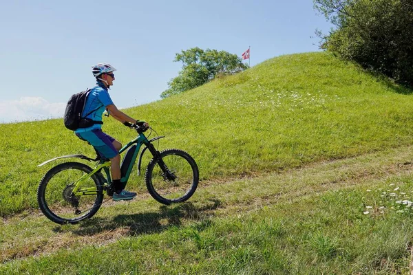 Boy Riding Bicycle Green Field Hill Switzerland Sunny Day — Stock Photo, Image