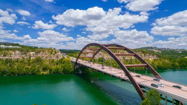 An aerial drone shot of the Pennybacker 360 bridge in Austin, Texas, USA clipart