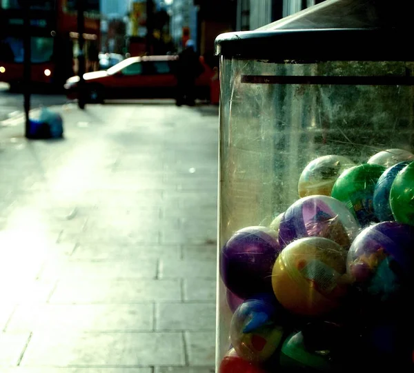 Glass Box Plastic Balls Toys Them Placed Street — Stock Photo, Image