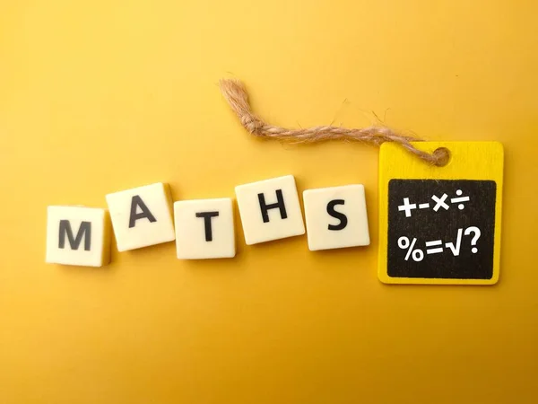 Toy Cubes Word Maths Math Symbols Blackboard Yellow Background Education — Stock Photo, Image