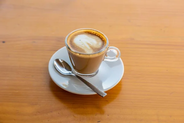 Bovenaanzicht Van Een Kop Koffie Een Schotel Naast Een Lepel — Stockfoto