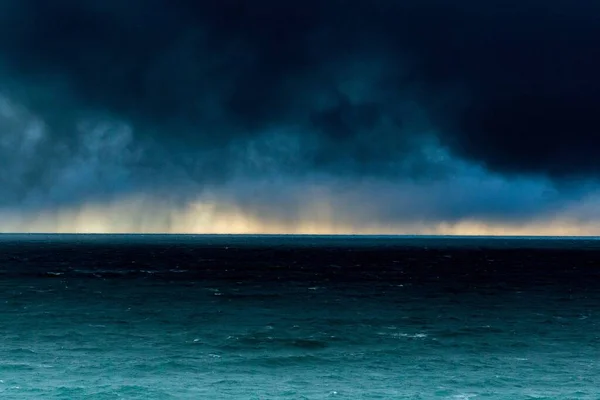 Blue Stormy Clouds Tranquil Sea Water Clear Yellow Horizon — Stock Photo, Image