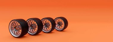 Turuncu arka planda izole edilmiş dört araba lastiğinin üç boyutlu kopyası.