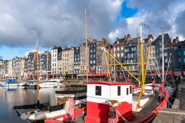 Honfleur, beautiful city in France, the harbor in the morning, typical houses