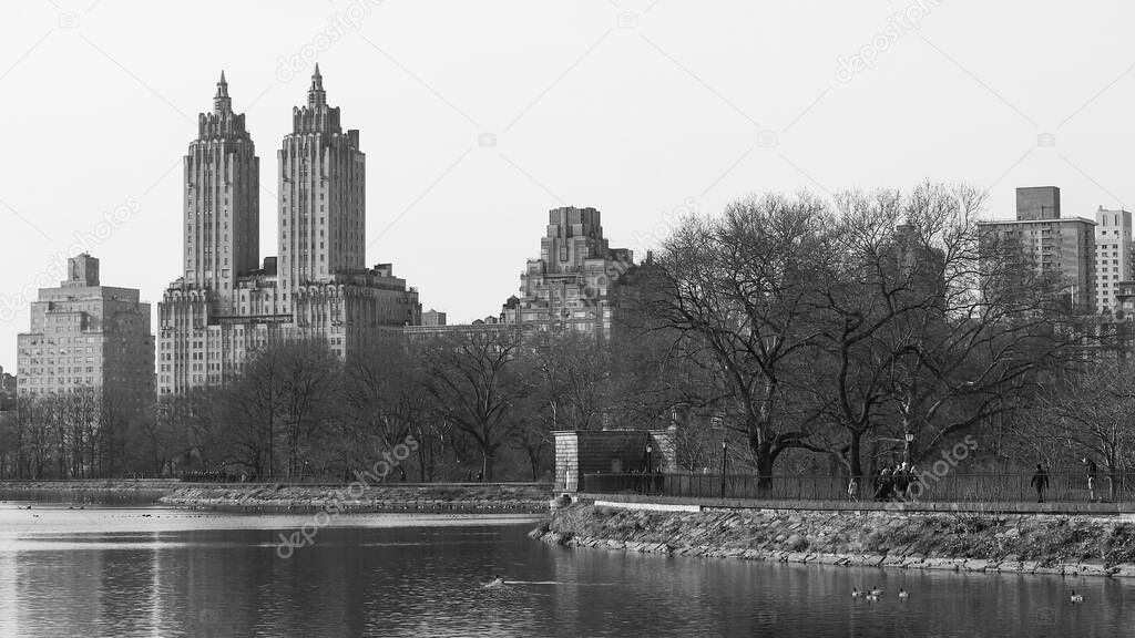 A monochrome of The Eldorado apartment building shot from Central Park Reservoir, New York City