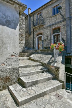 A small street between the old houses of Zungoli, one of the most beautiful villages in Italy.