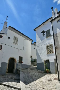 A small street between the old houses of Zungoli, one of the most beautiful villages in Italy.