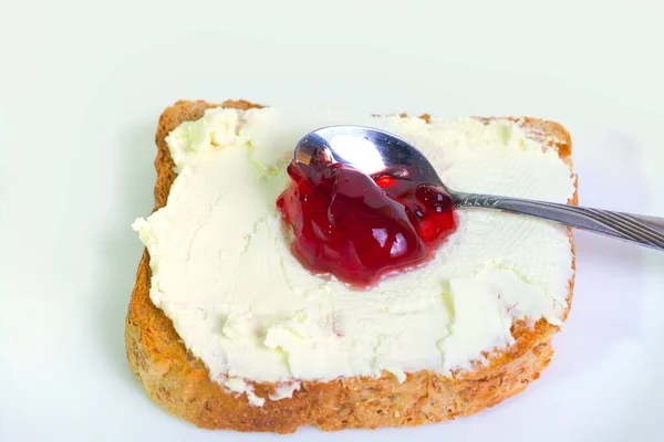Metal Spoon Red Jam Slice Toast Cream Cheese White Background — Stock Photo, Image