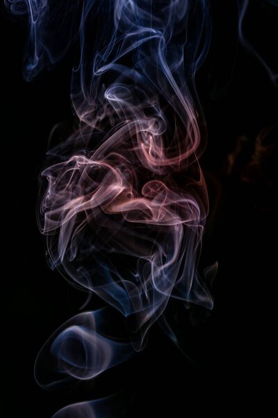 Smoke pattern of a scented stick close up