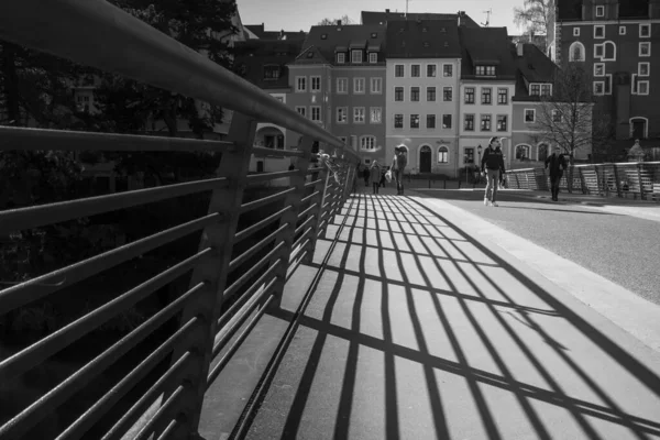 A shadow play on the old town bridge in Gorlitz