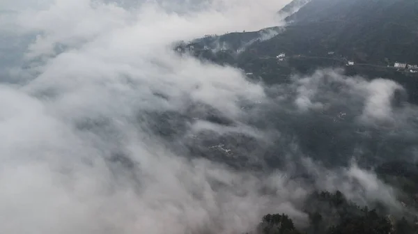 Aerial Shot Clouds Fog Covering Town Hill — Stock Photo, Image