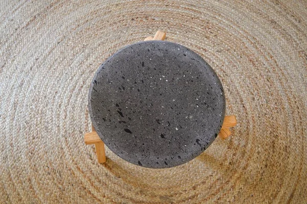 Designer Small Coffee Table Volcanic Stone Wooden Legs Jute Rug — Stock Photo, Image