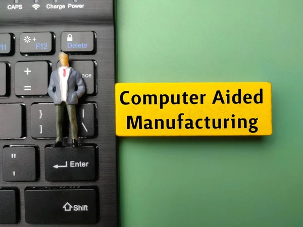Una Persona Miniatura Teclado Inalámbrico Con Palabra Computer Aided Manufacturing —  Fotos de Stock