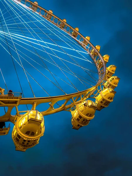 Vertical Low Angle View Yellow Amusement Park Carrousel Cabins Blue — Stock Photo, Image