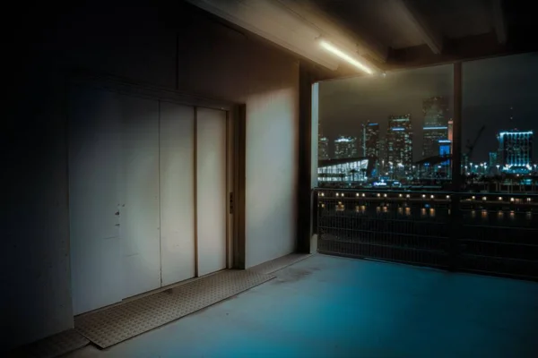 Elevator Parking Garage Night Window Overlooking City Illuminated Buildings — Stock Photo, Image