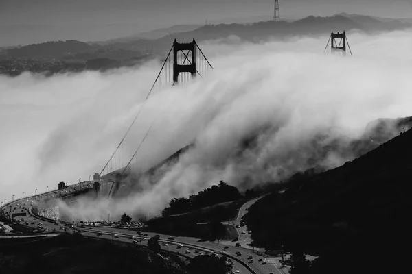 Grayscale Aerial View Misty Clouds Surrounding Historic Golden Gate Bridge — Stock Photo, Image