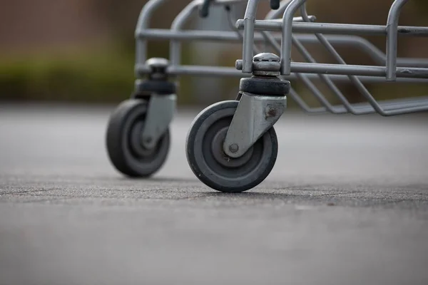 Closeup Wheels Shopping Cart — Stock Photo, Image