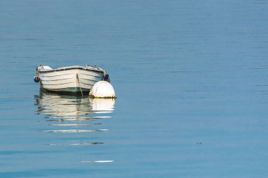 A white and red row boat, in Brittany, traditional ship in the Morbihan gulf