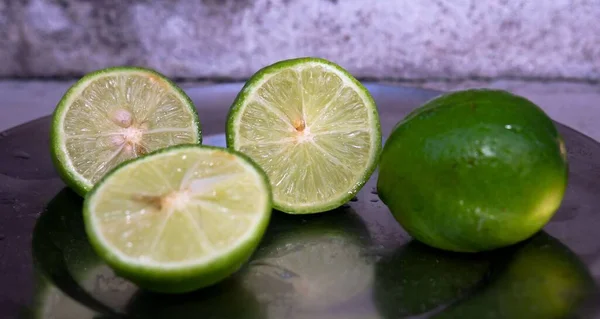 Gehele Groene Limon Schijfjes — Stockfoto