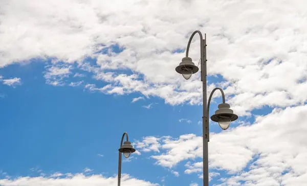 Closeup Shot Tall Street Lamps Background Blue Sky White Clouds — Stock Photo, Image