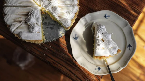 Sliced Delicious Vegan Lemon Tart Topped White Whipped Cream Background — Stock Photo, Image
