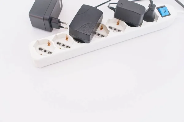 Power Strip Electrical Cables Chargers White Table Copy Space — Stock Photo, Image