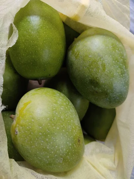 Vertical Shot Green Unripe Mangos Bag — Stock Photo, Image