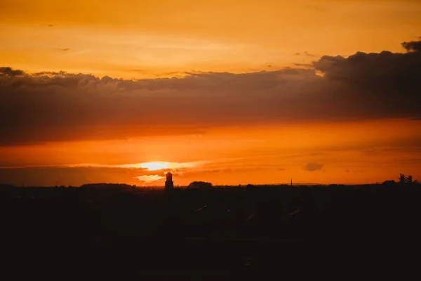 Breathtaking Orange Cloudy Sky Silhouette Small Church Distance — Stock Photo, Image