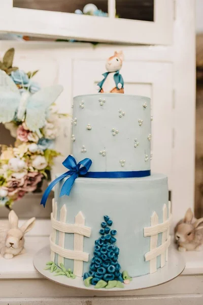 Vertical Shot Blue Two Tier Cake Easter Bunny Figurine Top — Stock Photo, Image