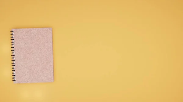 黄色の背景に茶色のノートブックのトップビュー 学校に戻るの概念 — ストック写真