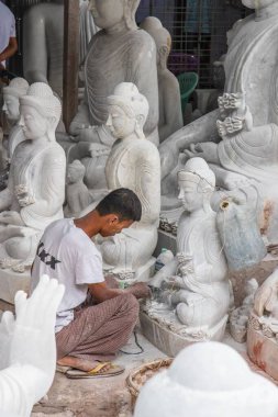 Stonemason working in Mandalay Myanmar Burma Southeast Asia