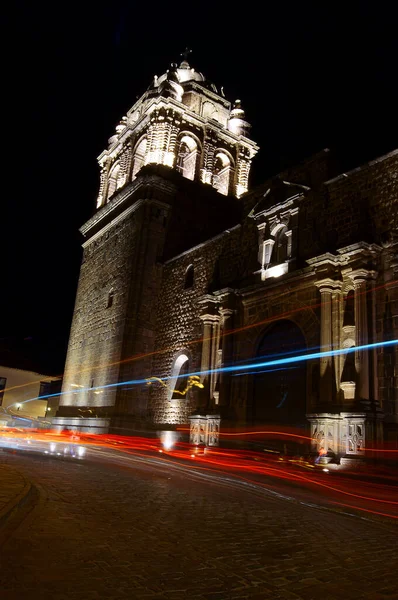 Vertical Long Exposure Shot Car Headlights Trails Front Illuminated Cathedral — Stock Photo, Image