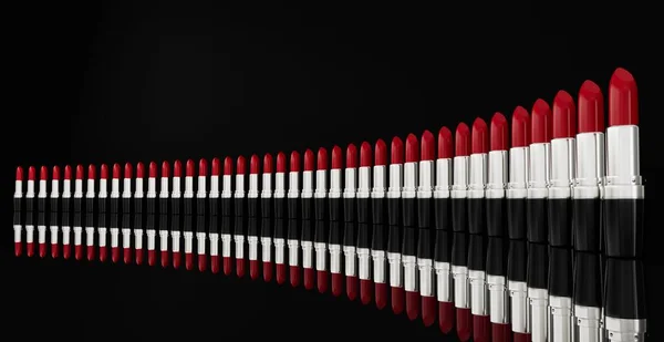 Some Lipsticks Set Wavy Row Black Background — Stock Photo, Image