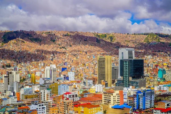 A panoramic view of highrises and shanty towns