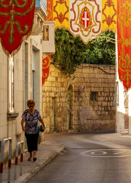 Vertical Shot Lady Walking Narrow Street Decorated Flags Lia Malta — Stock Photo, Image