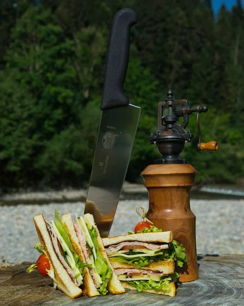 Vertical Shot Club Sandwich Knife Wooden Surface — Stock Photo, Image