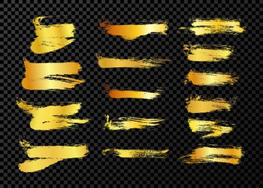 Big set of gold brush strokes. Hand drawn ink spots isolated on dark background. Vector illustration