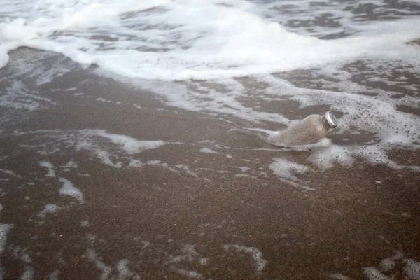 Glass Bottle Sand Half Buried Small Waves Seashore — Stock Photo, Image